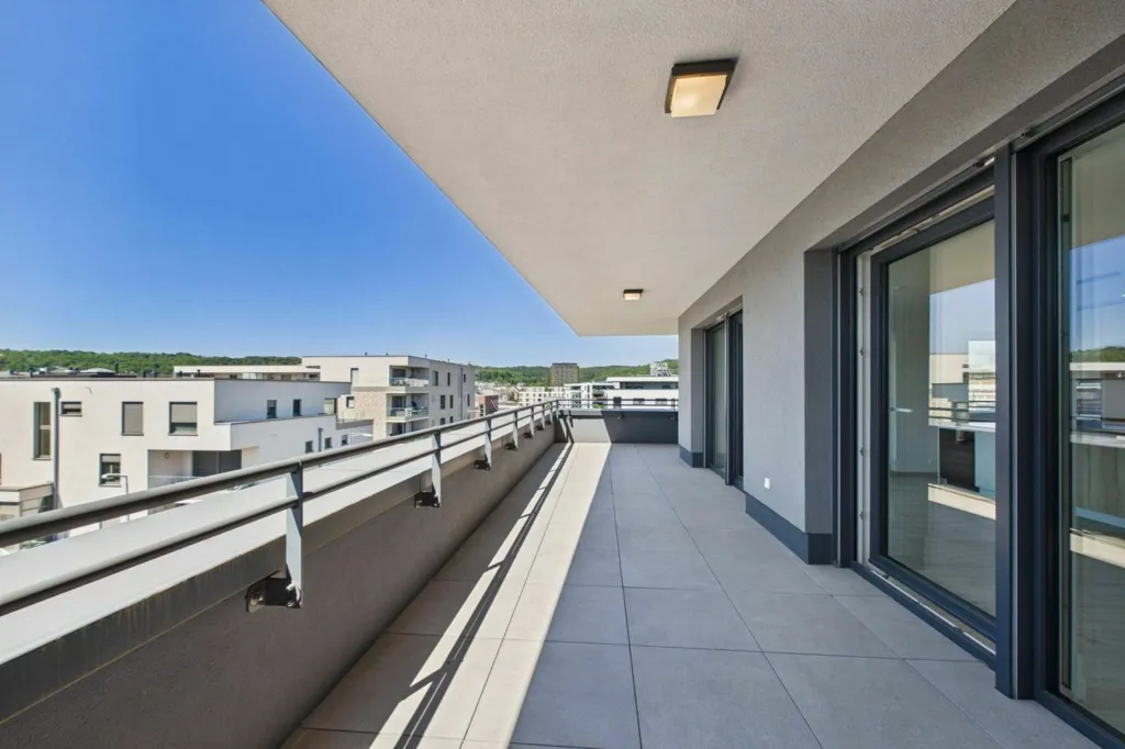 Balcony - Penthouse with Sea, Mountain, and City Views in Differdange