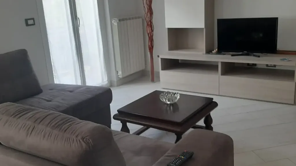 Living Room - Modernised Apartment with Balconies in Loano