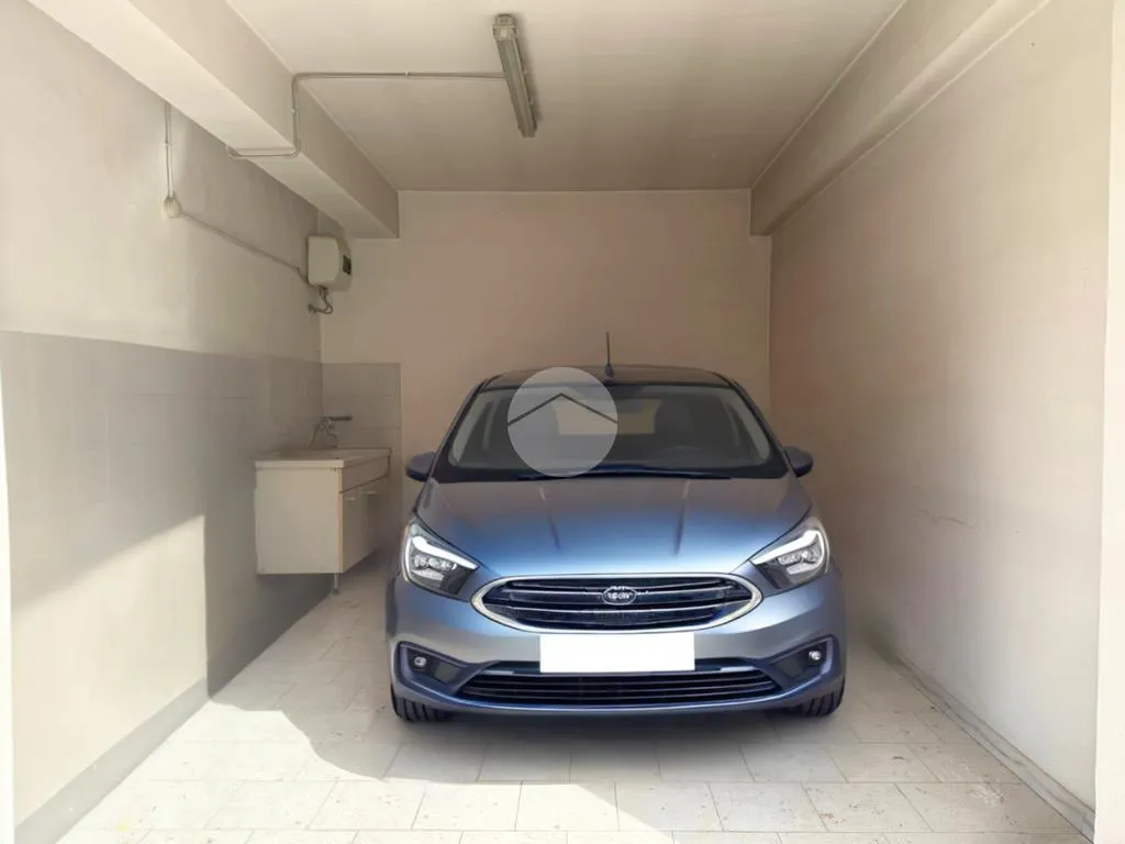 Garage - Four-Room Apartment with Balcony in Lucera