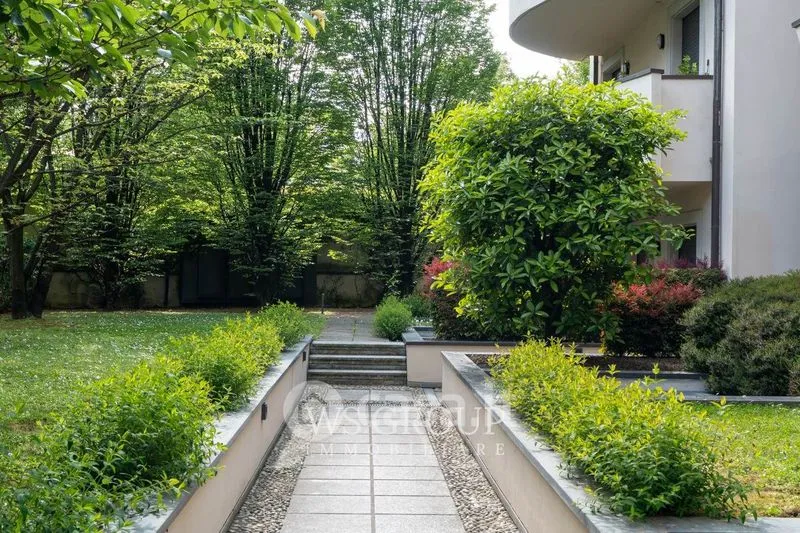 Garden - Modern Bilocale with Balcony in Monza