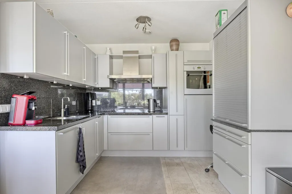 Kitchen - Light-Filled Apartment with Balcony in Central Tilburg
