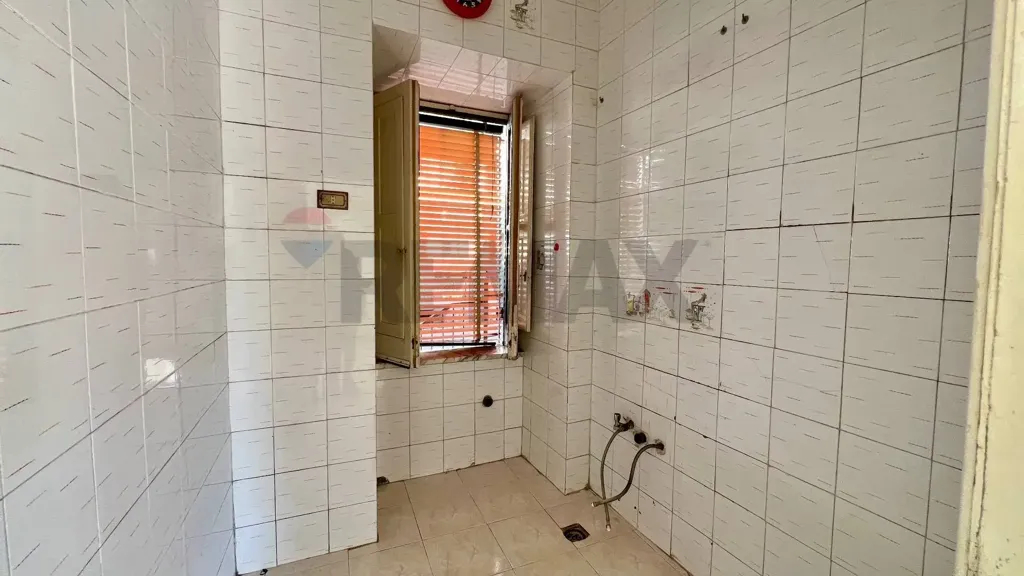 Salles de bain - Apartment with Terrace in Piscinola, Naples