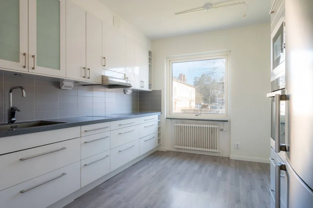 Kitchen - Renovated Apartment with Balcony in Södermanland