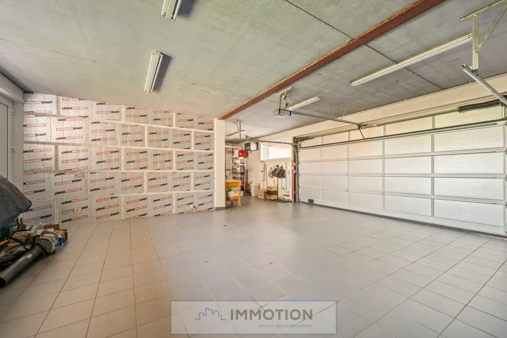 Garage - Stylish Villa with South-Facing Garden in Luxurious Setting