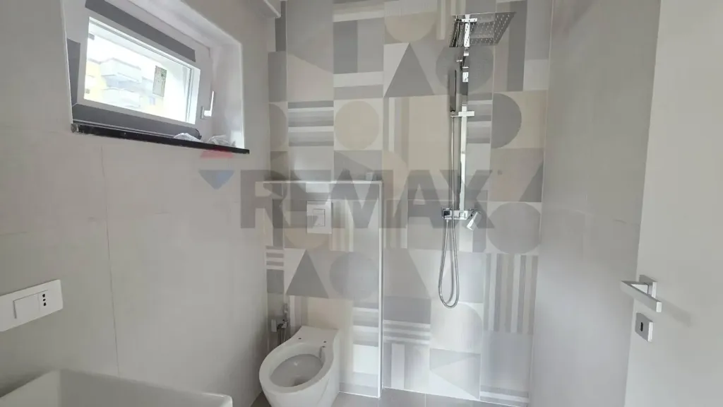 Bathrooms - Modern Apartment with Terrace in Cosenza