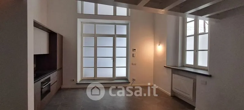 Kitchen - Elegant Trilocale with Private Patio in Como