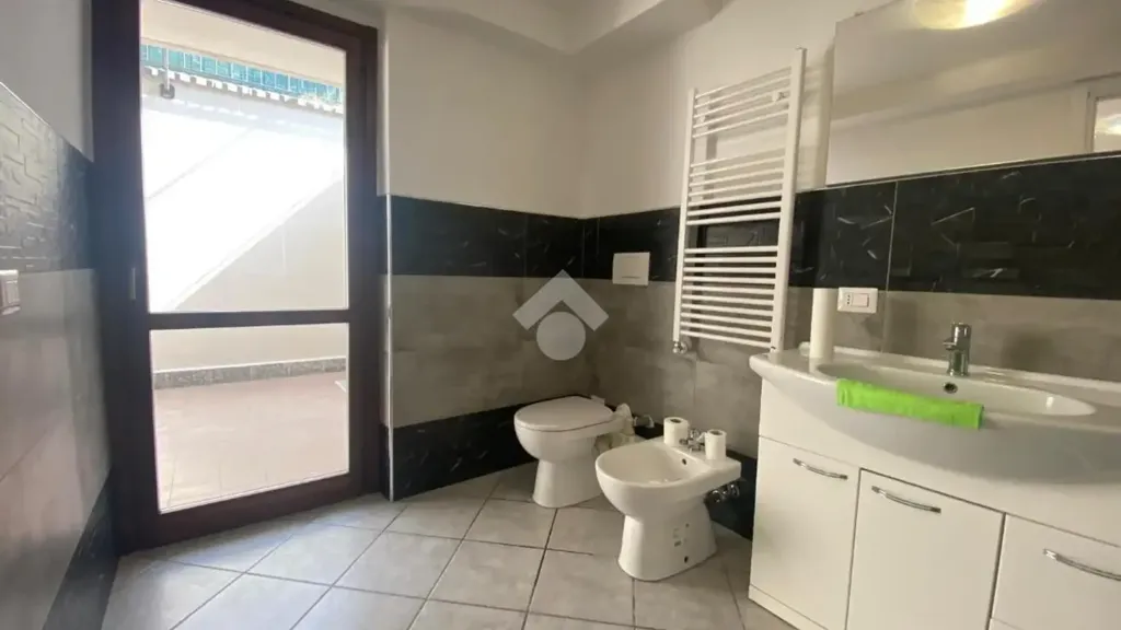 Bathrooms - Bright 2-Bedroom Apartment with Balcony in Corbetta