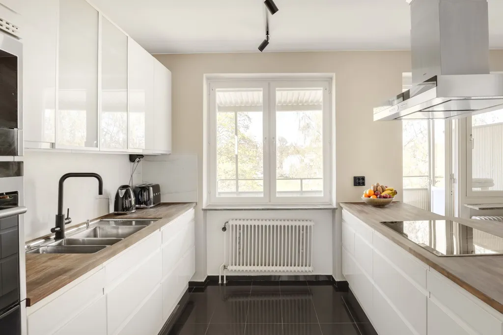 Kitchen - Corner Apartment with Park View in Norrköping