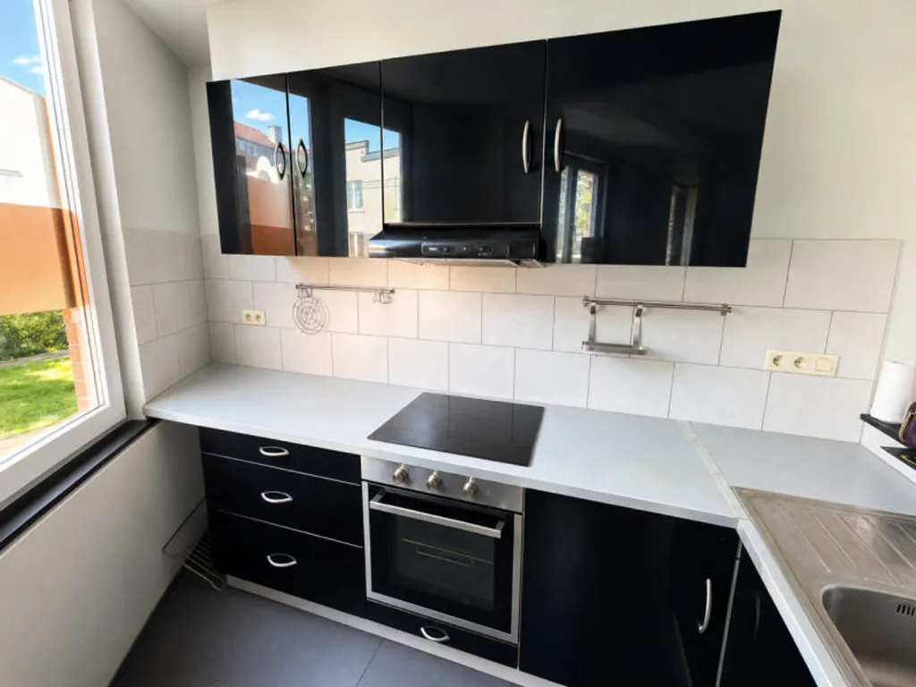 Cuisine - Appartement 2 Chambres dans un Environnement Calme à Anderlecht