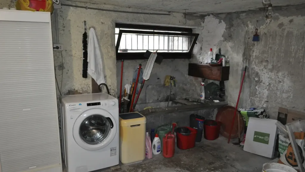 Pesuköök - Three-Bedroom Apartment with Balcony in Bedonia
