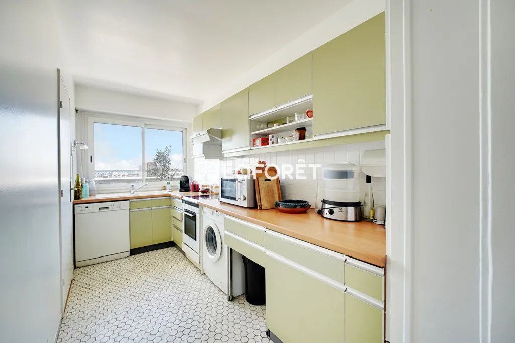 Cuisine - Appartement 3 Pièces avec Vue Panoramique à Paris