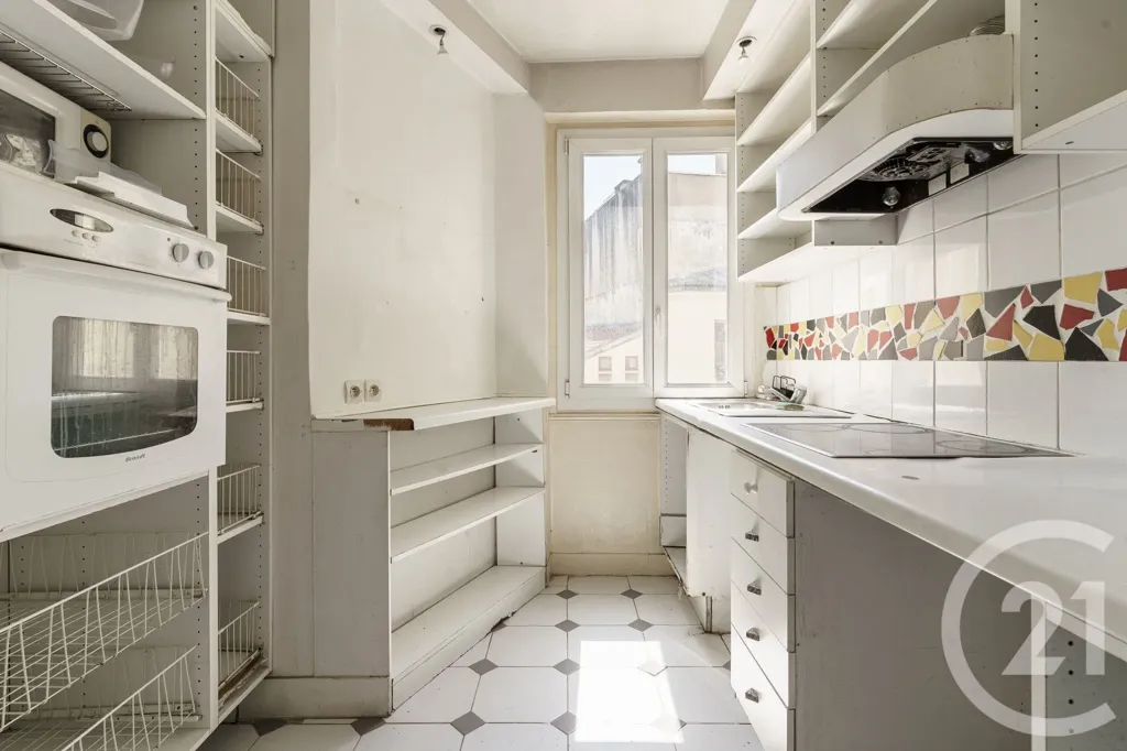 Cuisine - Appartement Familial avec Moulures à Paris 19ème