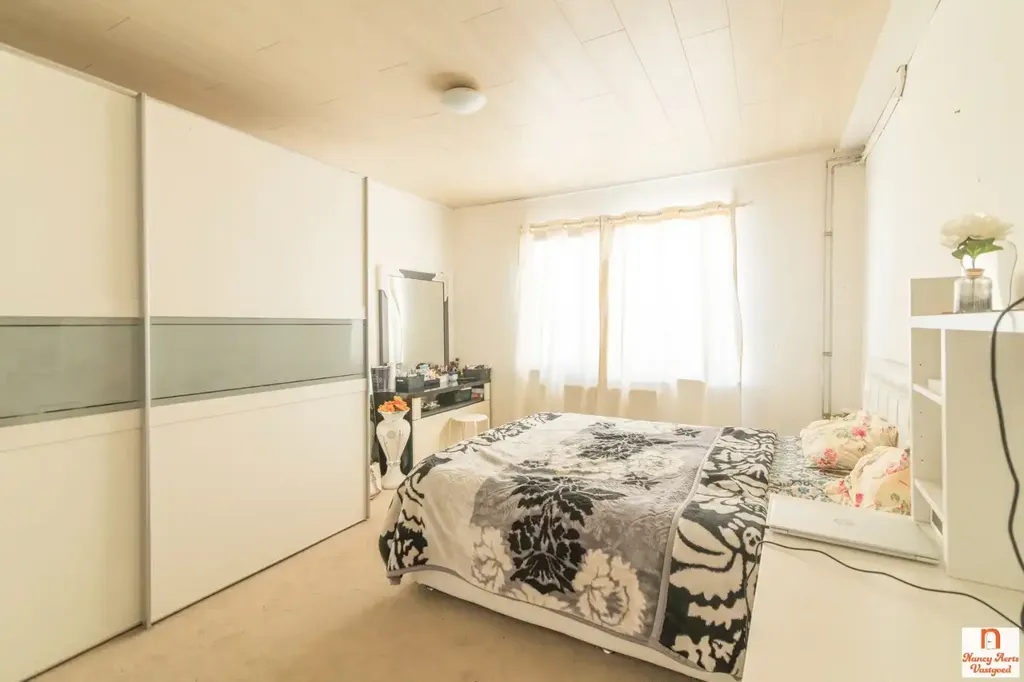 Bedrooms - Apartment Building with High Visibility in Herk-de-Stad