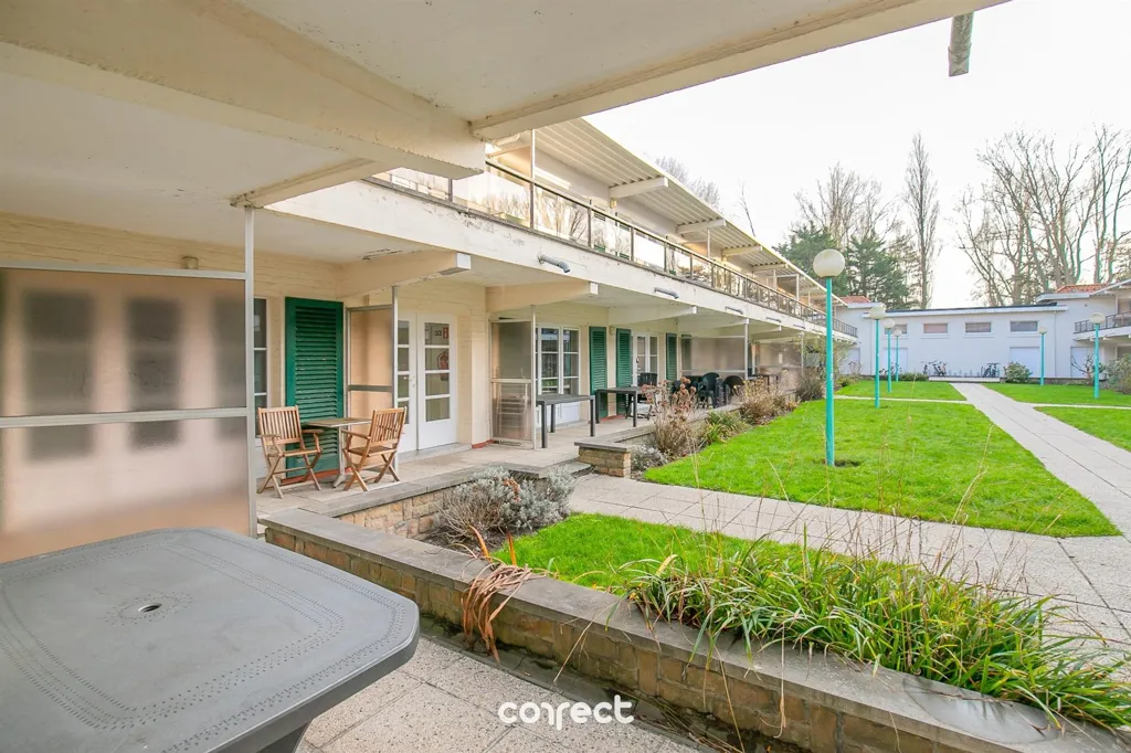 Terrass - Apartment with Garden View in De Haan