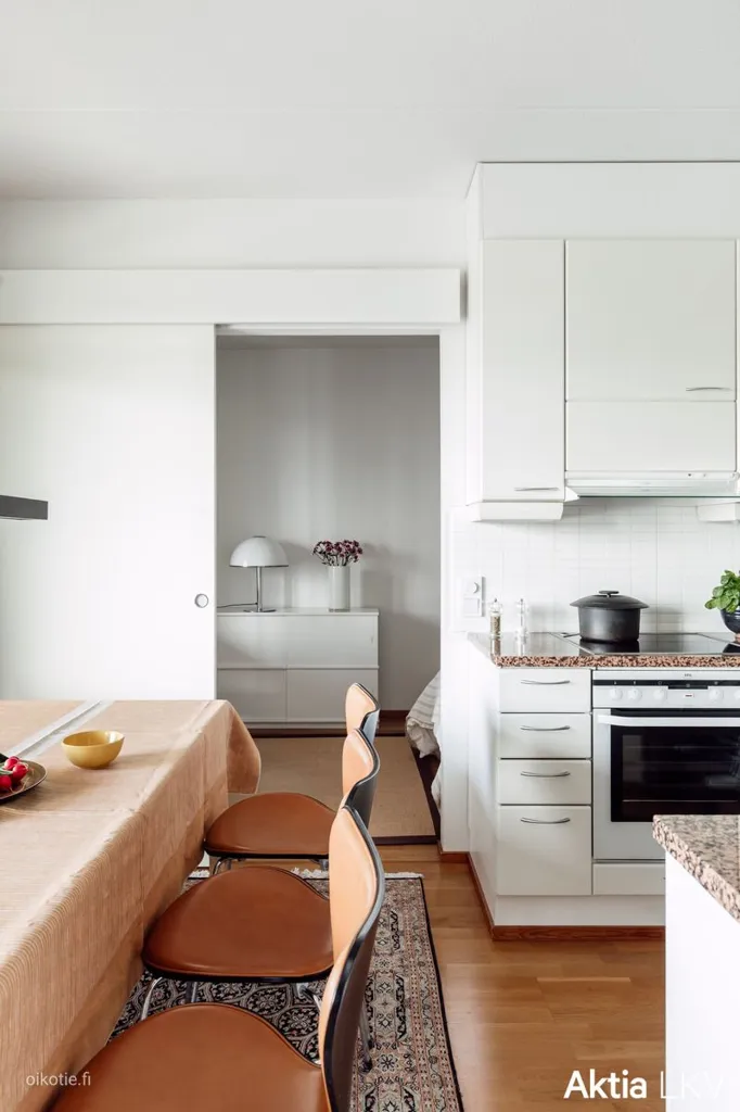 Kitchen - Modern City Flat with West Balcony in Espoo