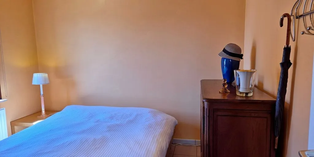 Chambres - Appartement avec Vue sur les Dunes à Westende