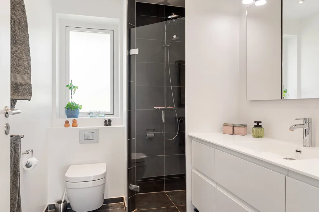Bathrooms - Modern Rowhouse with Garden in Ålsgårde