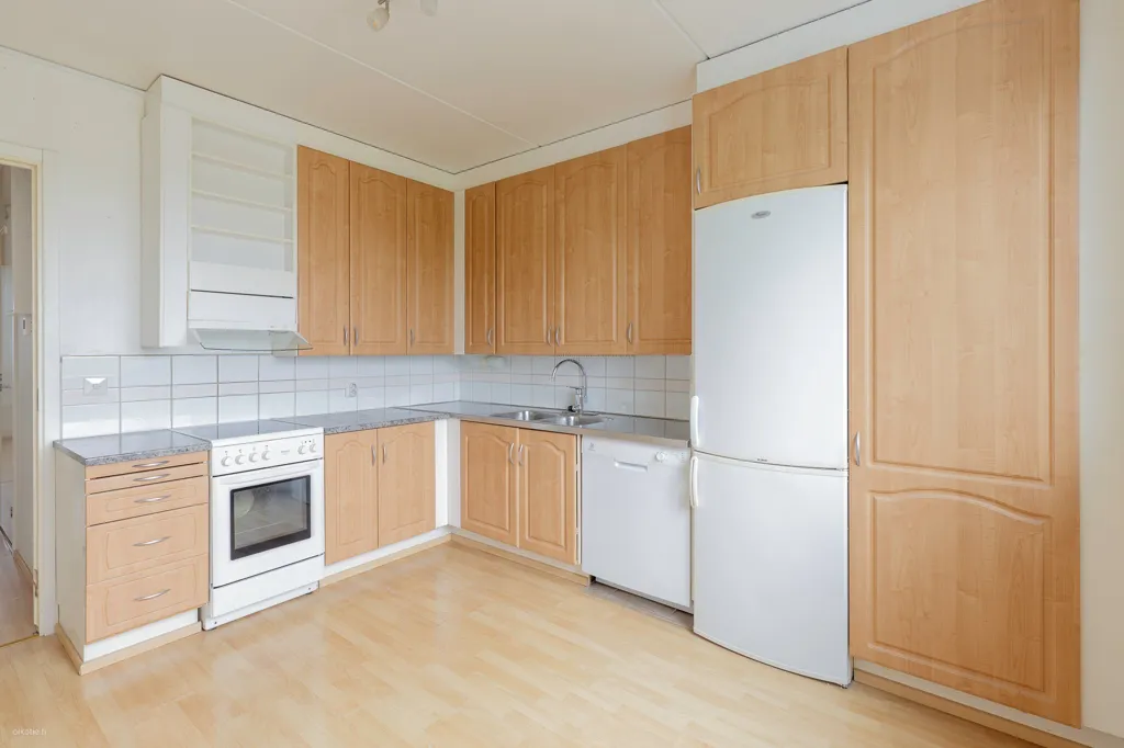 Cuisine - Spacious Apartment with West-Facing Balcony in Tampere