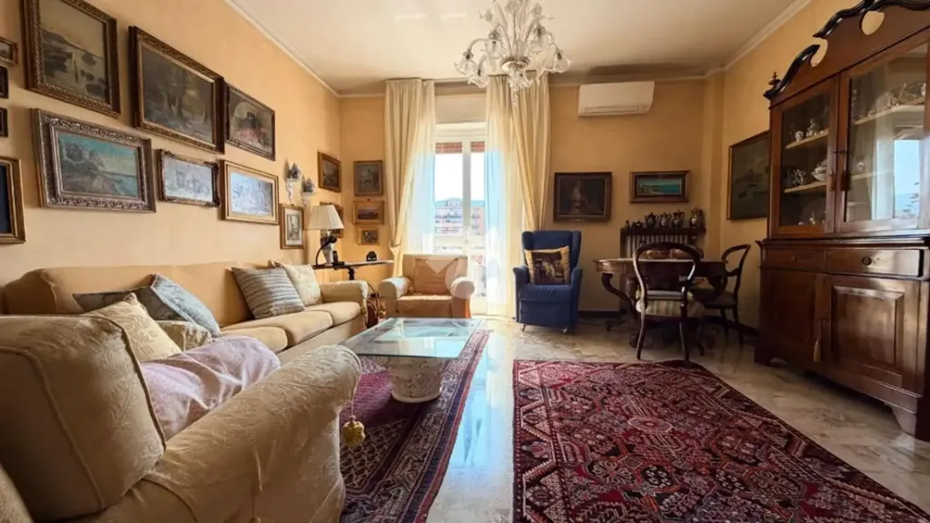 Soggiorno - Trilocale with Balcony in Brescia