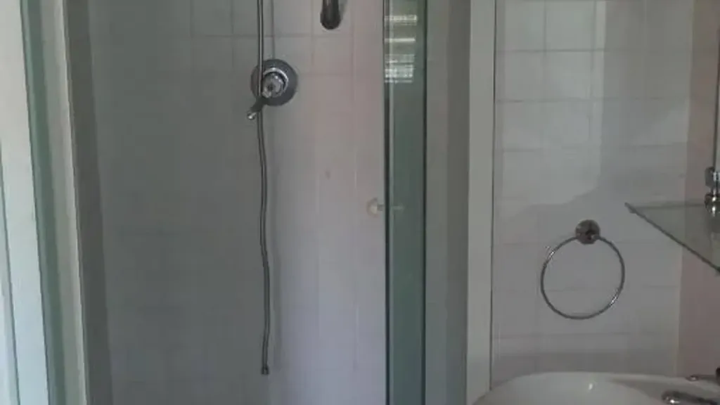 Bathrooms - Restoration-Ready Apartment with Balcony in Pontedera