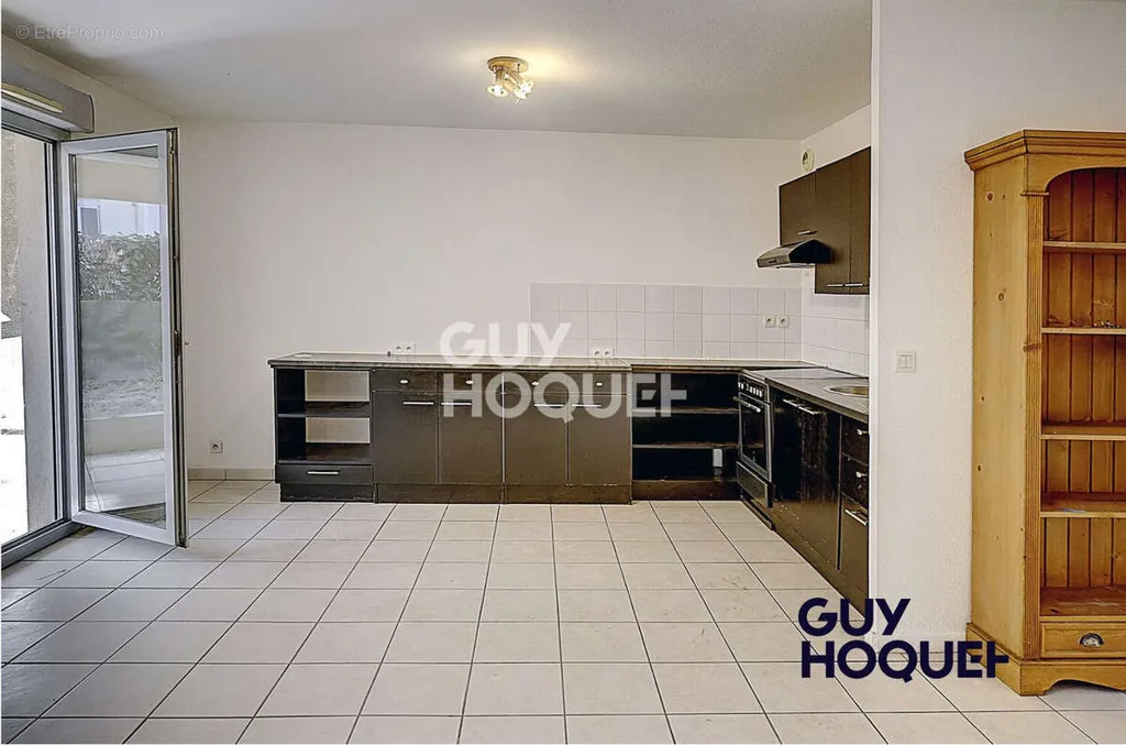 Cuisine - Appartement en Rez-de-Jardin avec Jardin à Villefranche Sur Saône