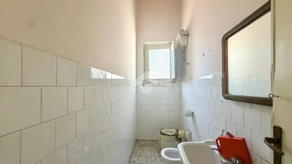 Salles de bain - Ground Floor Apartment with Courtyard in Cosenza