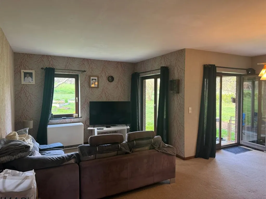 Wohnzimmer - Charming 2-Bedroom House with Garden in Quiet Area