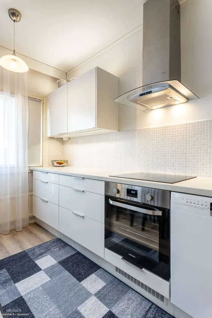 Kitchen - Spacious Apartment with Balcony in Vantaa