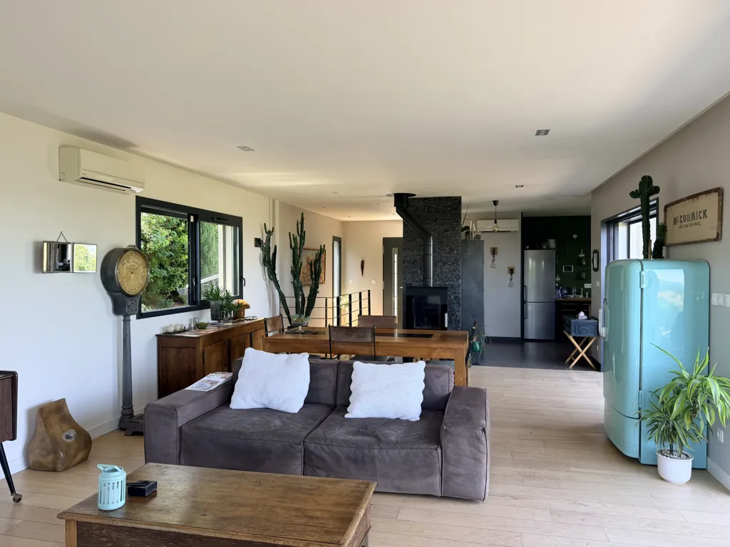 Living Room - Contemporary House with Panoramic View in Green Setting