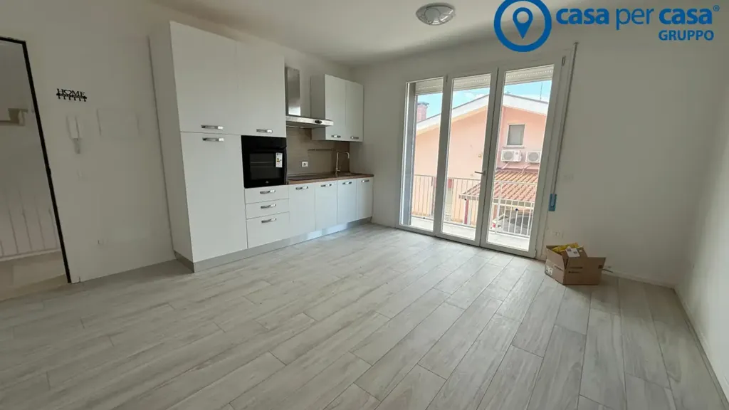 Séjour - Newly Built Apartment with Private Garden in Porto Viro