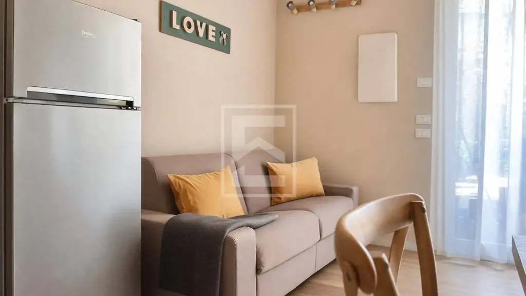 Living Room - Restored Triplex with Garden View in Manerba del Garda