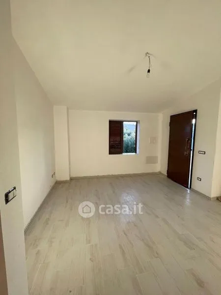 Rooms - Two-Level Apartment with Veranda in Torpè
