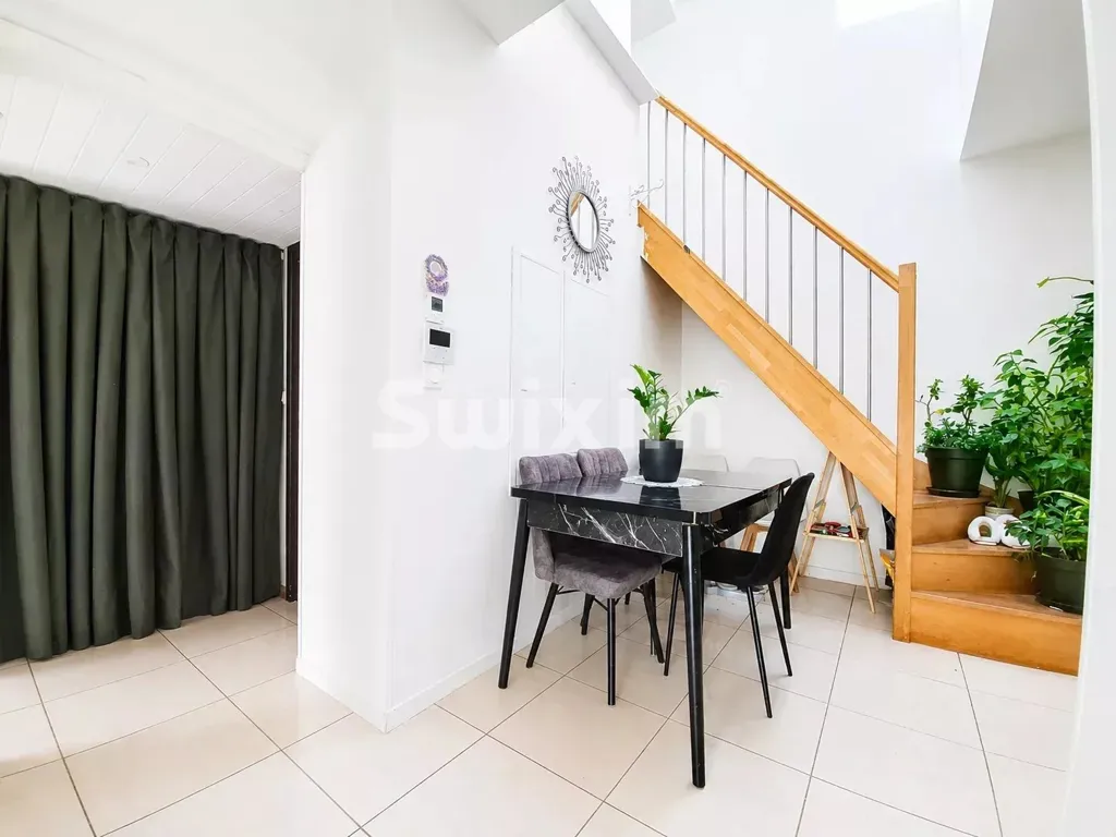 Dining Room - Mixed-Use Building with Apartments in Valserhône