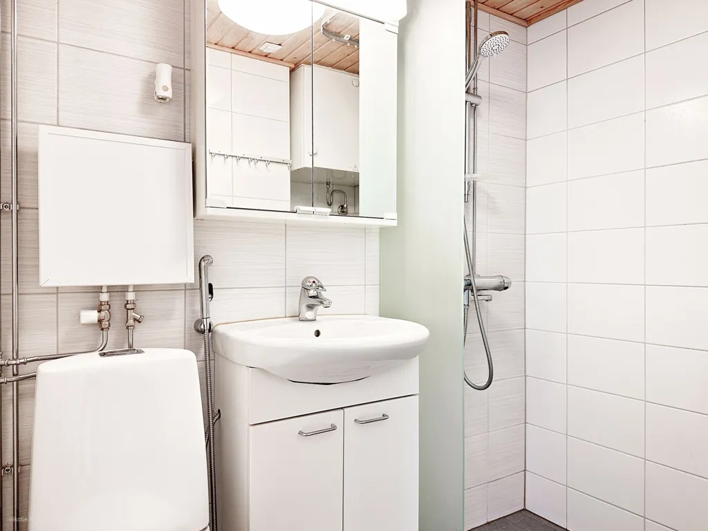 Bathrooms - Modern Studio with Balcony in Tampere Centre