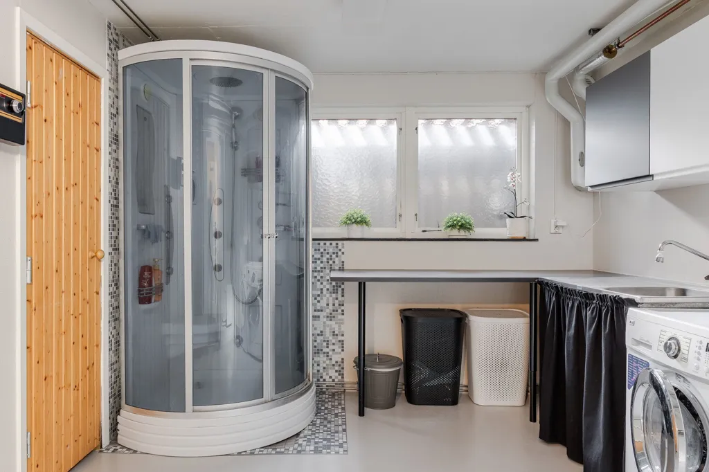 Bathrooms - Architectural Villa with Rental Unit in Väster