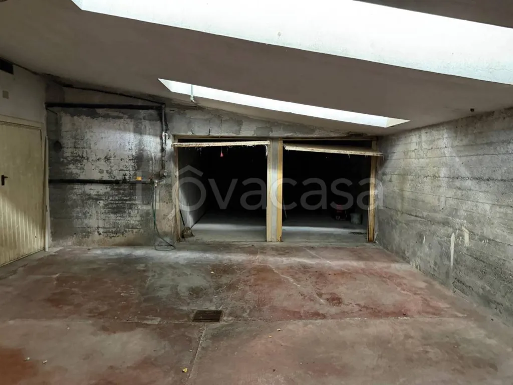 Garage - Two-Bedroom Apartment with Balcony in Chiomonte