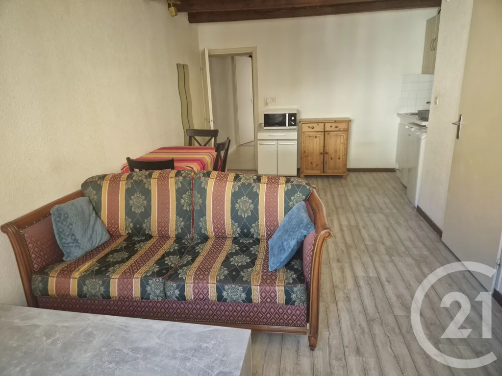 Séjour - Appartement T2 avec Poutre Apparente à Morez
