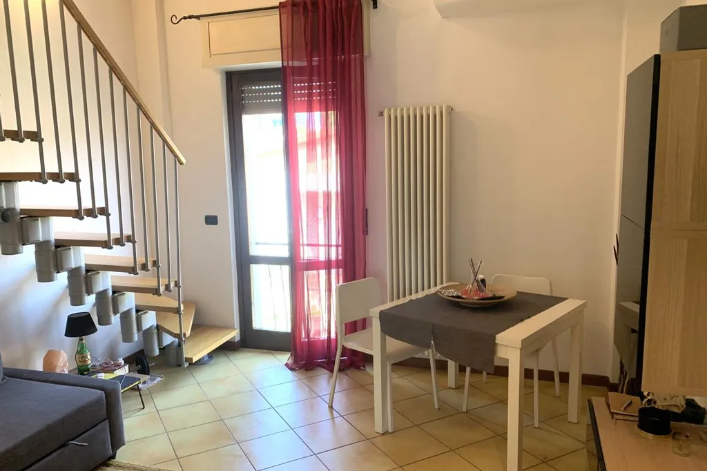 Living Room - Duplex Apartment with Balcony in Monza