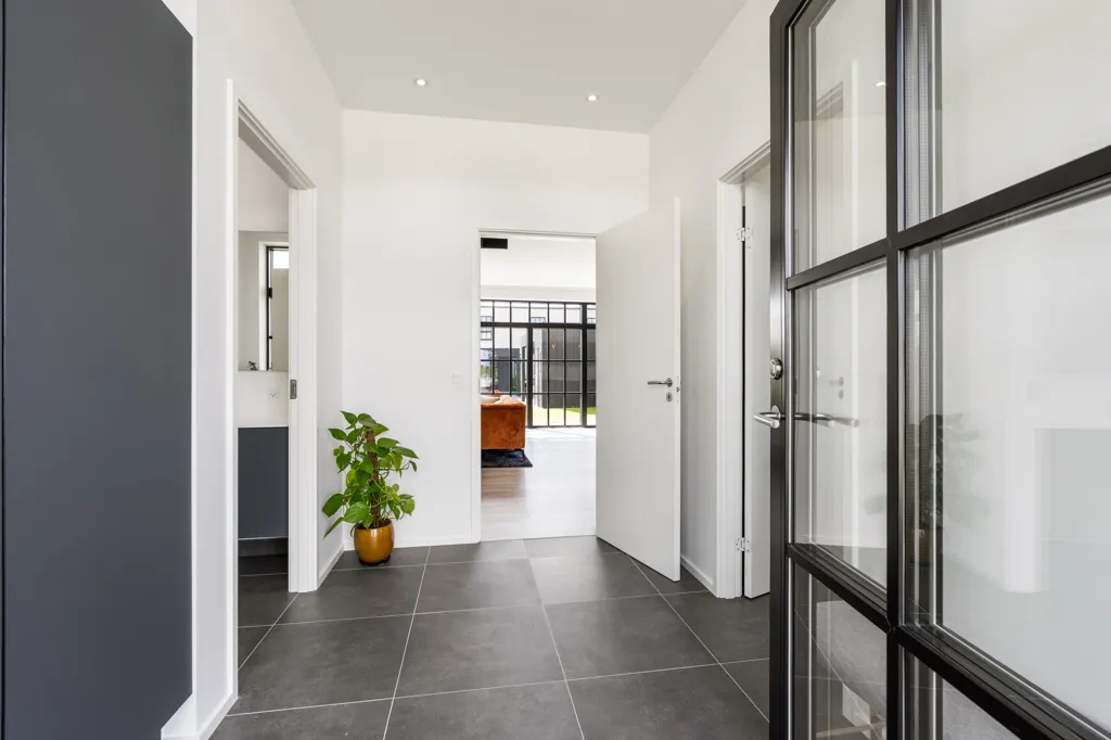 Esik - Modern Rowhouse with South-Facing Garden in Paderup
