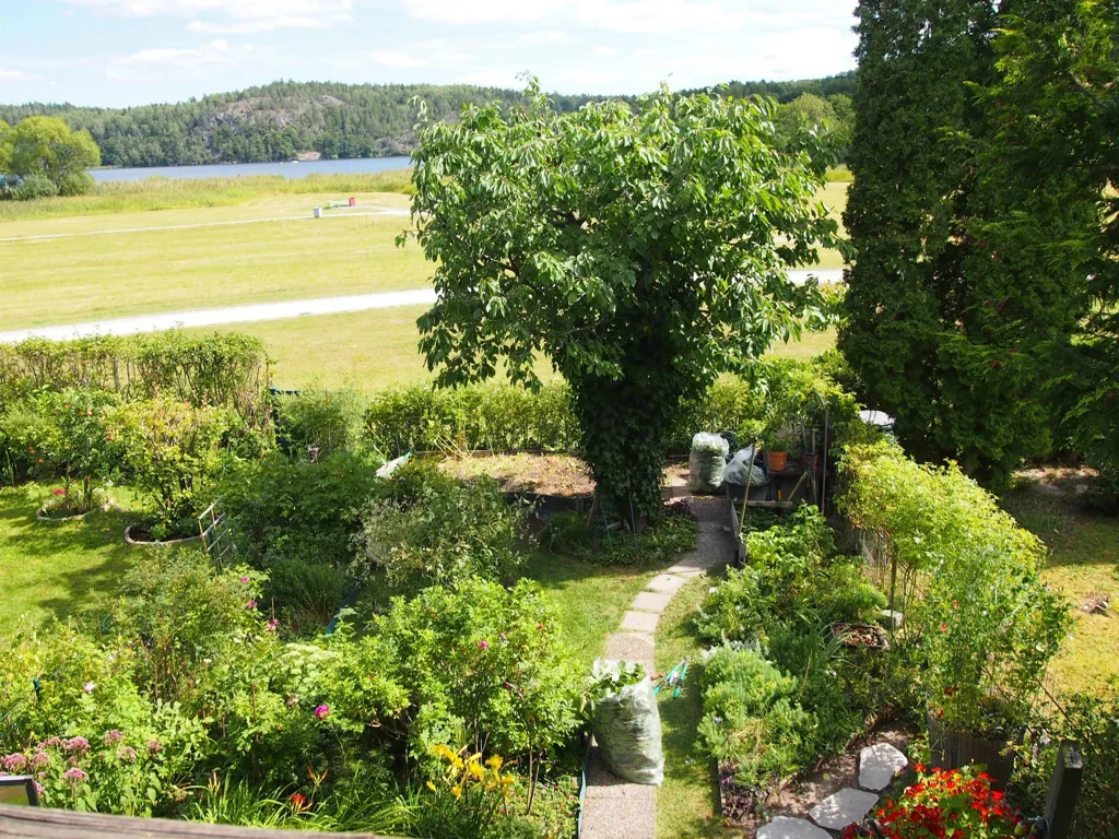 Jardin - Terraced House with Lake View in Alby