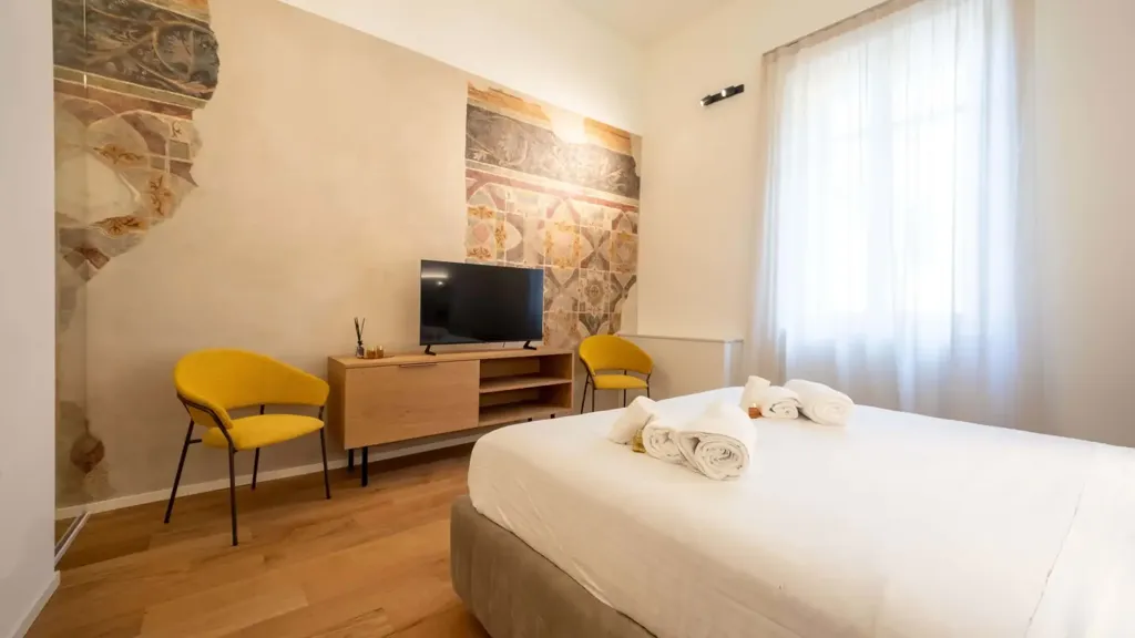 Bedrooms - Restored 2-Bedroom Apartment in Verona