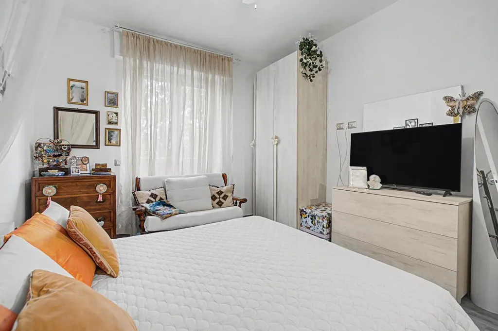 Bedrooms - Rear-Accessed Apartment with Parking in Milan