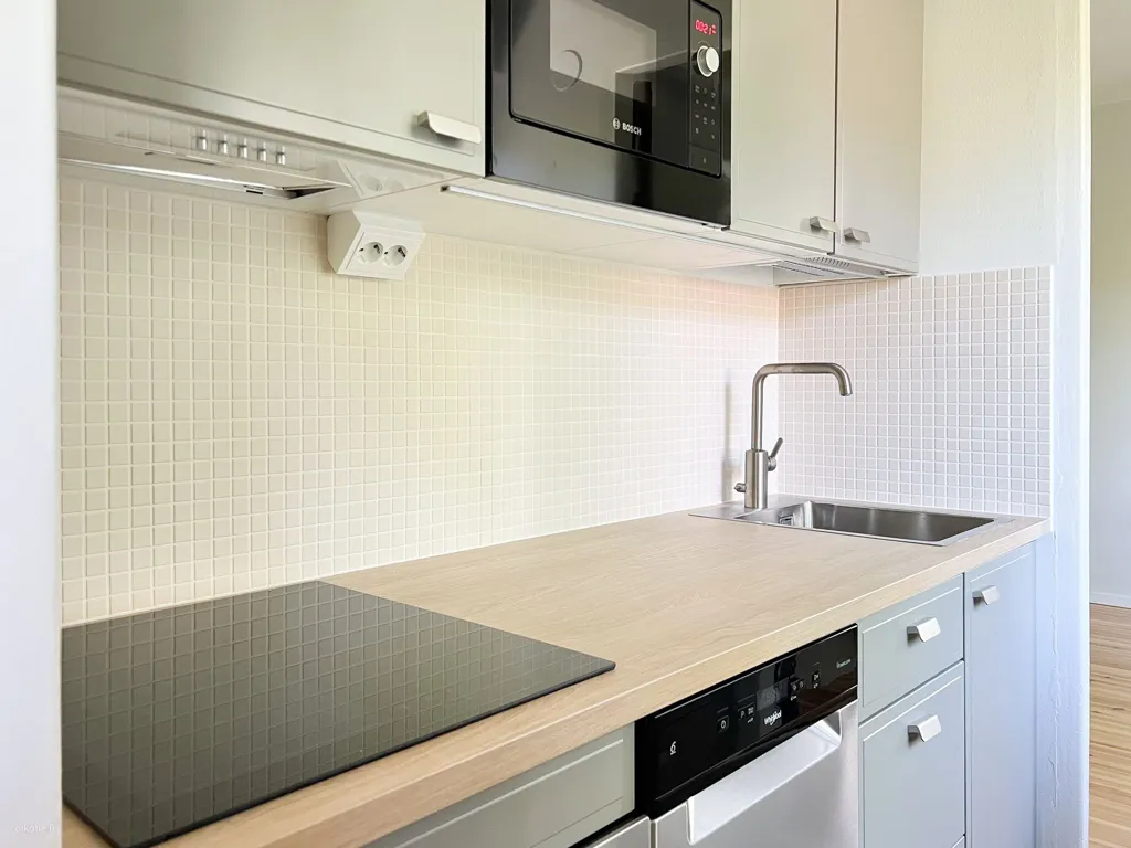 Kitchen - Upper Floor Apartment with Balcony in Toukola, Helsinki