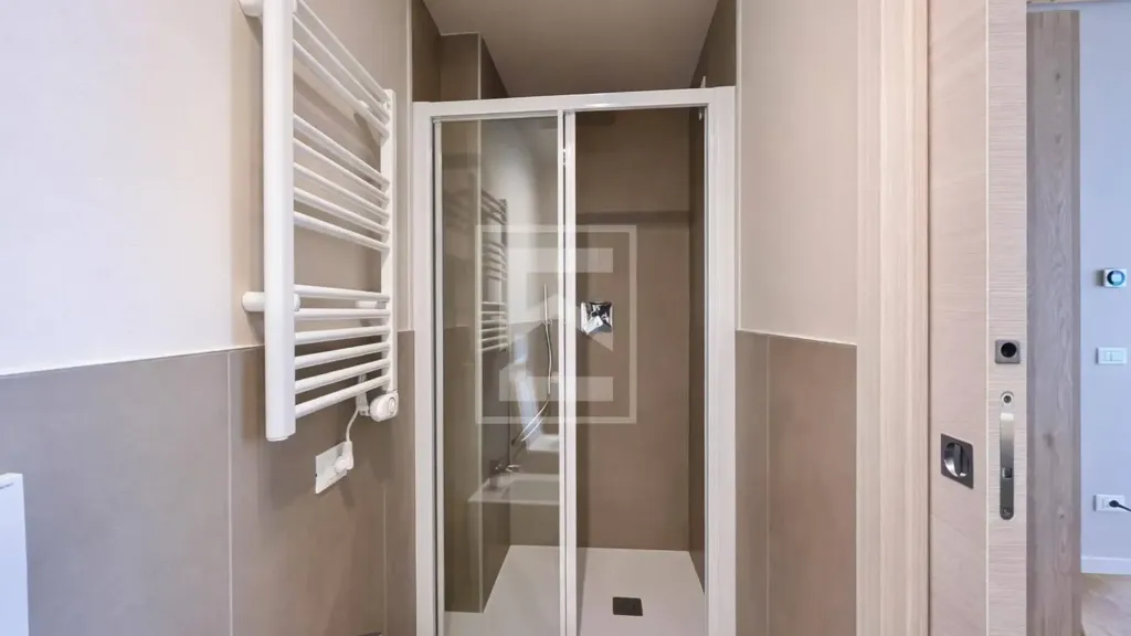 Bathrooms - Restored Triplex with Garden View in Manerba del Garda