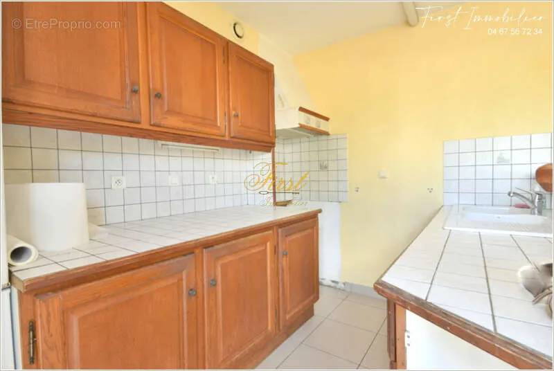 Cuisine - Appartement en Rez-de-Chaussée avec Jardinet à Beaulieu