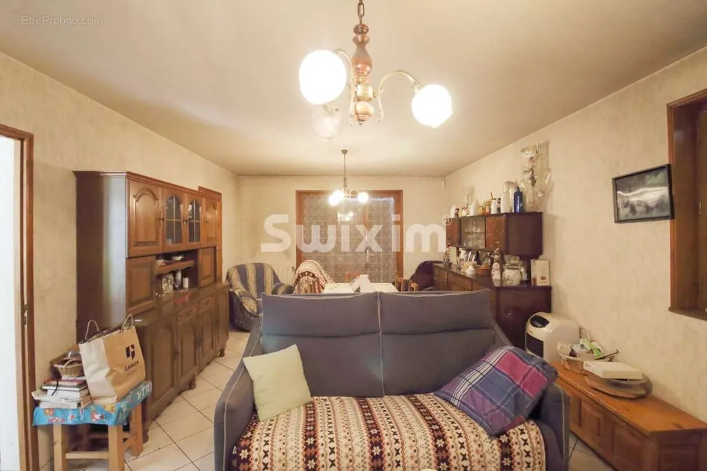 Living Room - Four-Bedroom House with Garage in Rural Setting