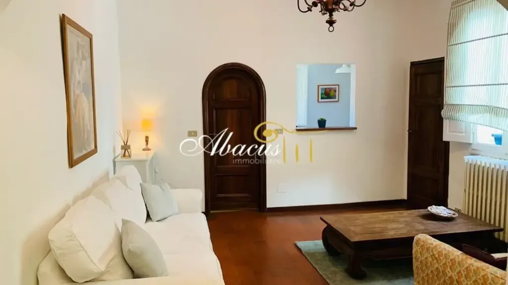 Living Room - Historic Apartment with Piazza View in Florence