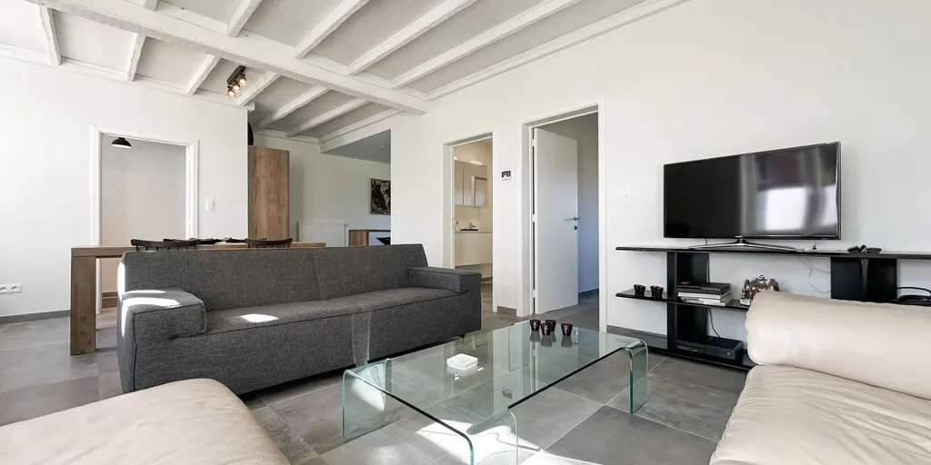 Séjour - Appartement Charmant avec Garage à Heusden