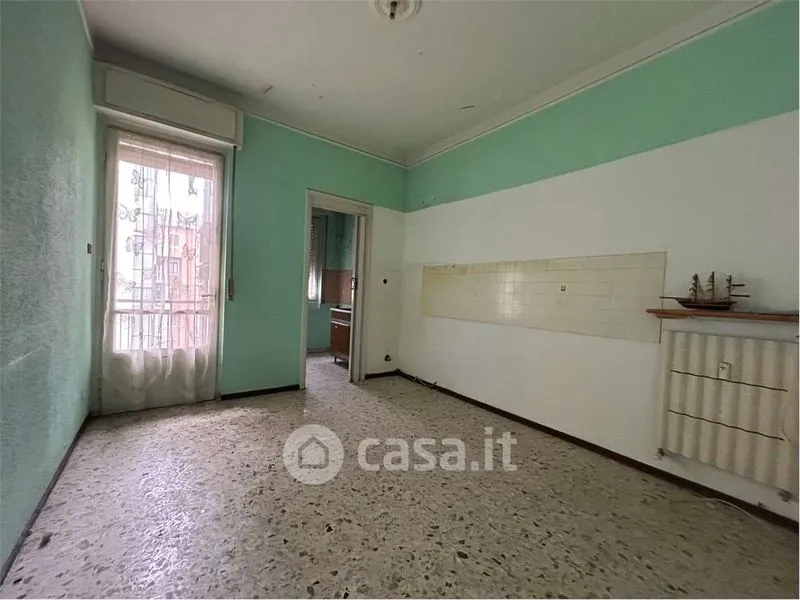 Séjour - Three-Bedroom Apartment with Balcony in Vercelli
