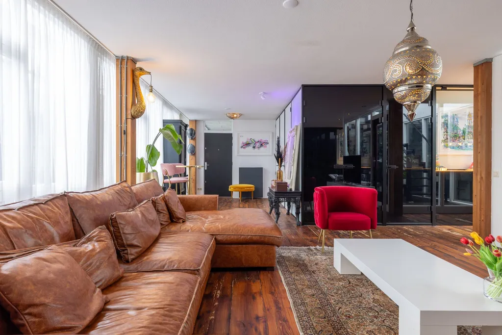 Living Room - High-End Industrial Loft with Skyline View in Rotterdam